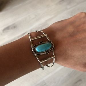 Silver bangle with turquoise stone